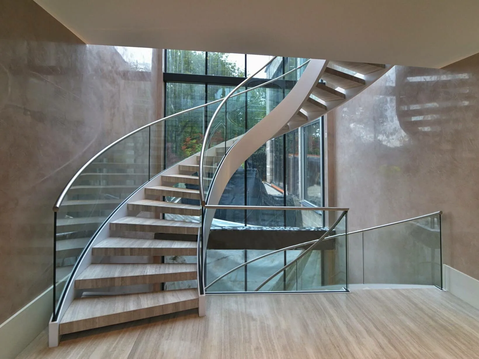 Masterful Wood, Metal, and Glass Stair Builds